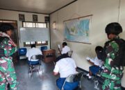 Personel Satgas Yonif R 631/Atg Sukseskan Pelaksanaan Ujian Nasional di SMP Negeri Tsing