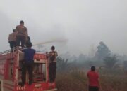 Polres Pulang Pisau Bersama BPBD dan Damkar Padamkan Titik Api