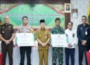 Serahkan Dana Hibah Pengamanan Pilkada 2024, Ini Harapan Pj Bupati Deddy