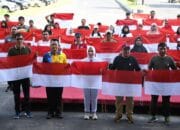 Jelang HUT RI 2024, Pemkab Pulpis Bagikan Bendera Merah Putih