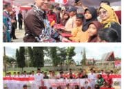 Jelang HUT RI Ke-79, Pj Bupati Barsel Bagikan Langsung Bendera Merah Putih Kepada Masyarakat
